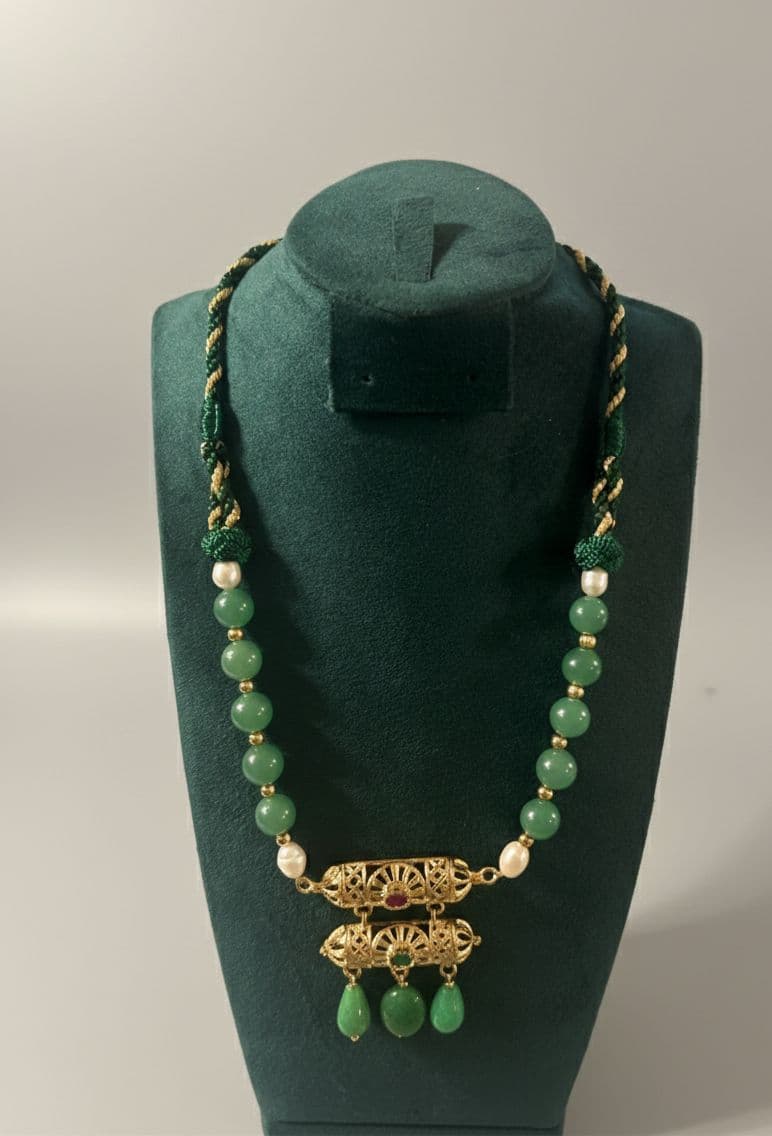 Silver necklace with precious stones